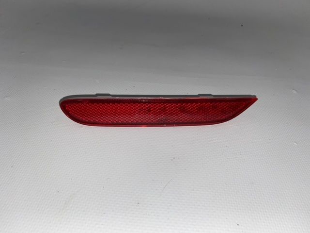 Катафот заднього бампера лівий Nissan QASHQAI 2016-2018 (26565-JJ90A), аналог